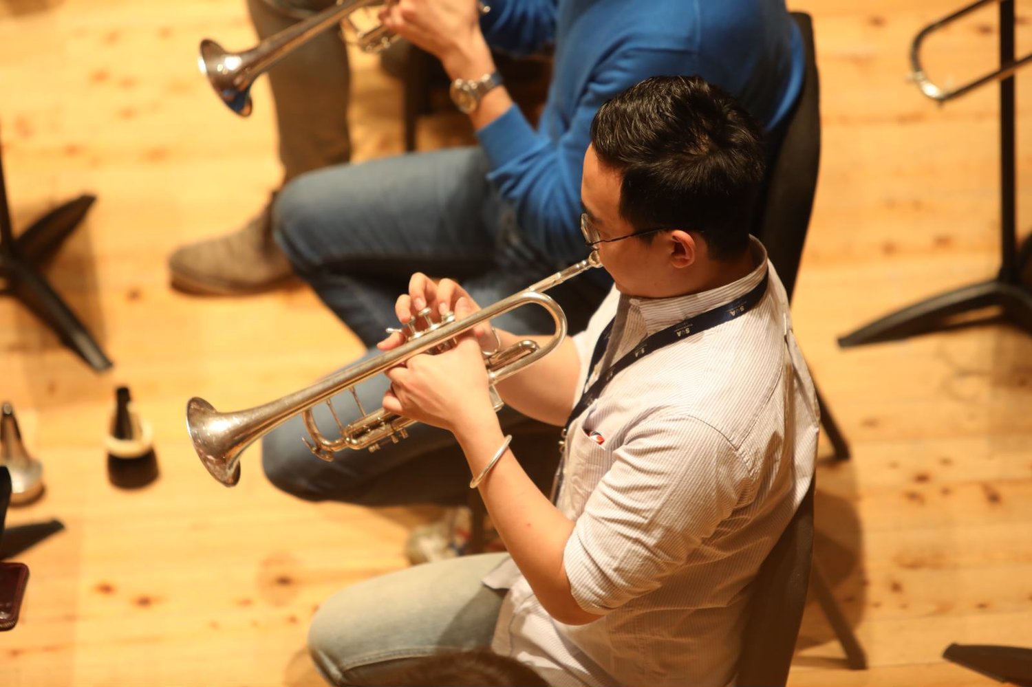 Seen in sequence: Benny (holding clarinet), Qiu Sheng, Yi-Ting and Xian Long (frontmost) in rehearsal.