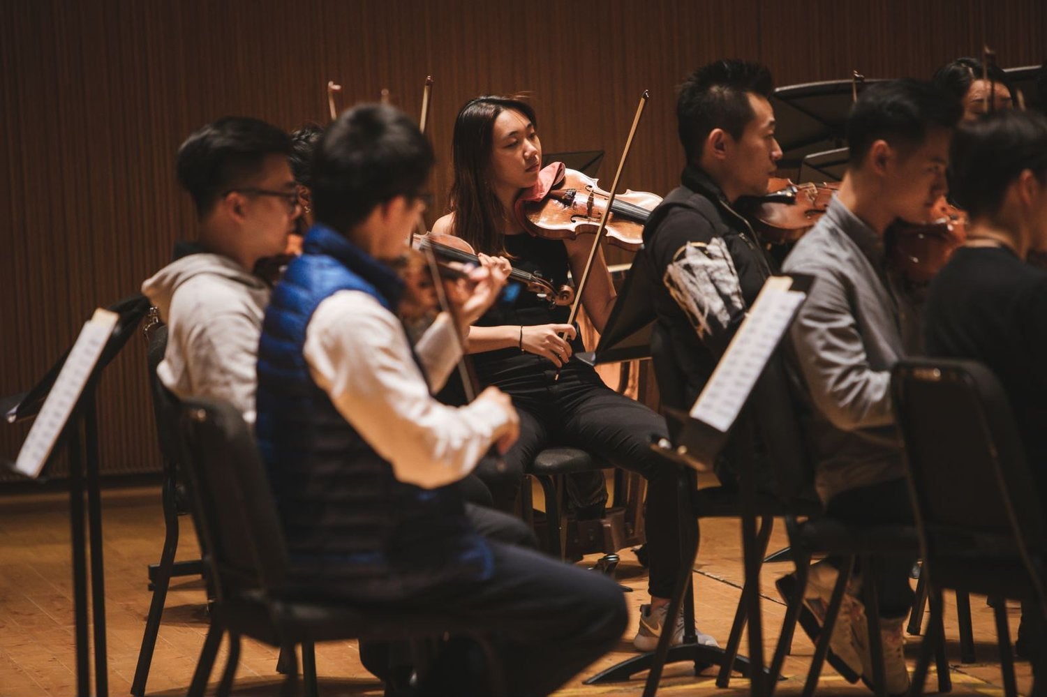 Seen in sequence: Benny (holding clarinet), Qiu Sheng, Yi-Ting and Xian Long (frontmost) in rehearsal.