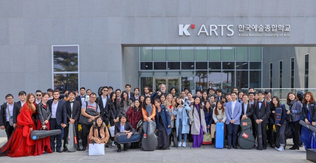 The YST Conservatory Orchestra in front of the Korea National University of Arts.
