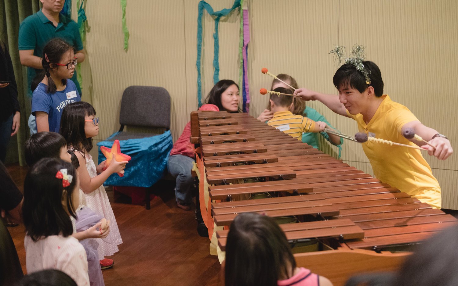 Participants were led through an underwater adventure, making friends with sea creature characters who each had an associated musical instrument, played by our students.