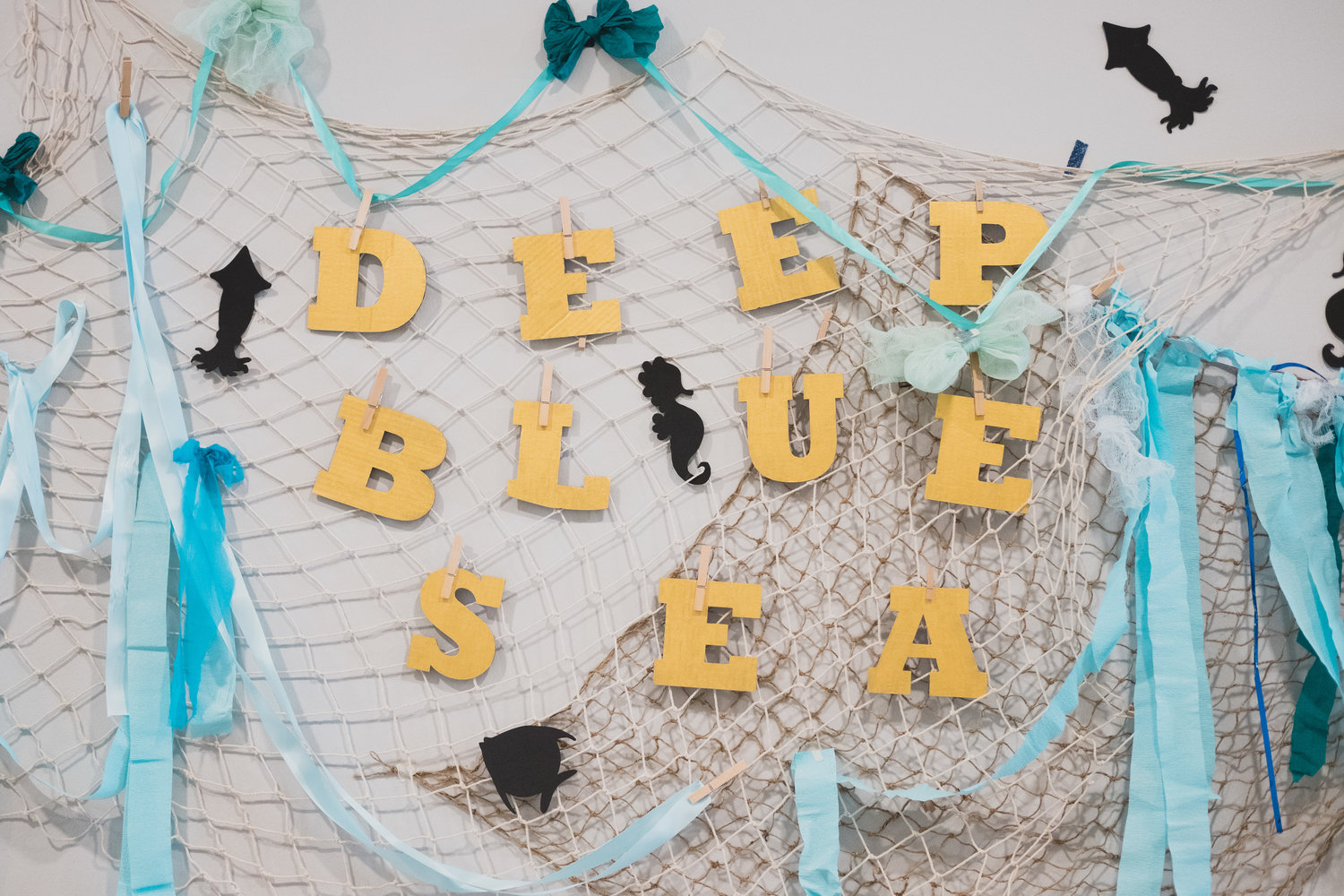 Backdrop and artwork for the Deep Blue Sea performance space.